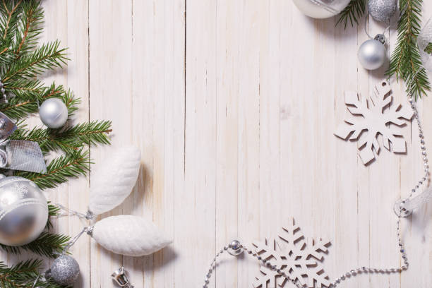 istock Silver Christmas decoration on wooden background 888982820