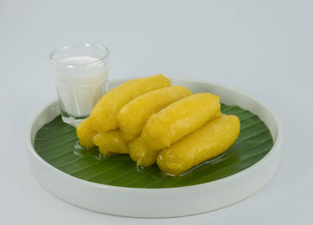 istock Preserved banana in syrup, Thai style, served on a white background. 888984008