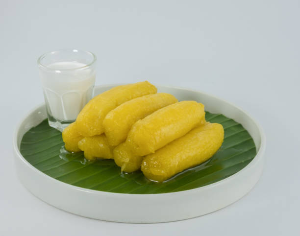 istock Preserved banana in syrup, Thai style, served on a white background. 888985594