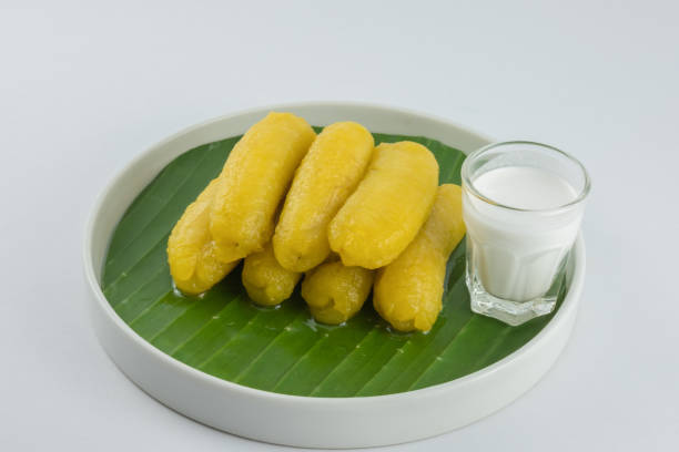 istock Preserved banana in syrup, Thai style, served on a white background. 888987662