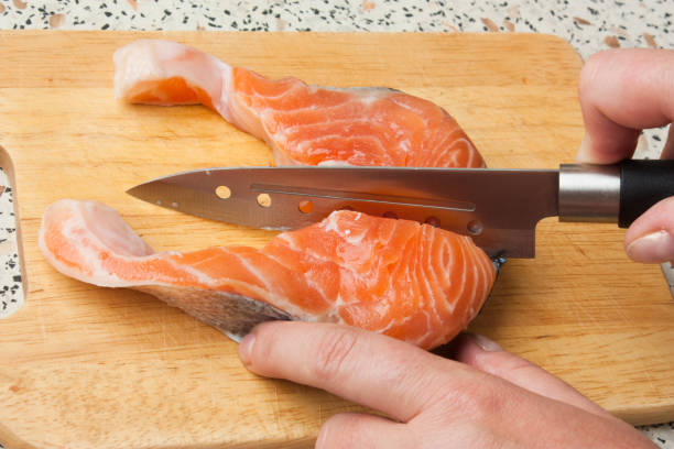 istock butchering of salmon 888991012
