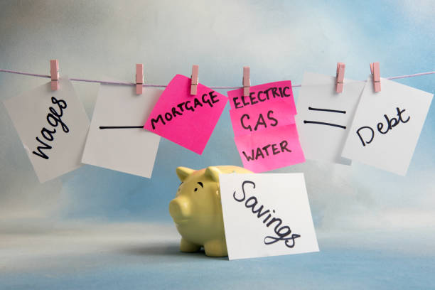 Household outgoings equation including bills, savings and wages Household outgoings equation including bills, savings and wages on a time line financial wellbeing stock pictures, royalty-free photos & images