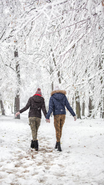 istock Young women enjoying in snow 889002996