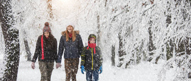 istock Family enjoying in snow 889011800