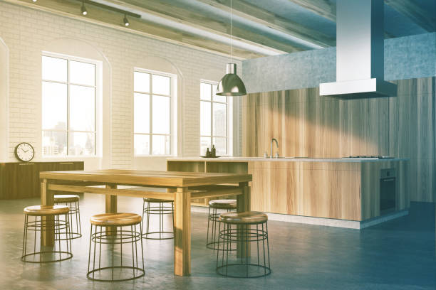 istock Concrete and wooden dining room, side toned 889019940