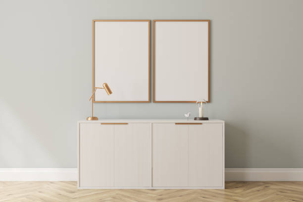 istock White chest of drawers and posters 889026256