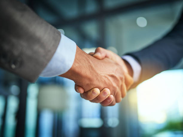 istock Closing deals is what they do 889031262