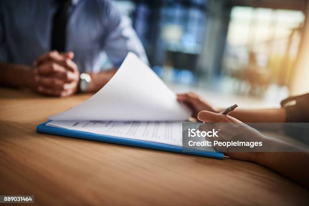 Combing Through The Fine Print Stock Photo - Download Image Now - Document, Insurance, Paper