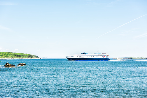 Oslo, Norway 0 August, 2019: Akershus Fortress/ Castle and  the AIDA Luna cruise ship in the harbor of Oslo. The castle was built around somewhere in the 1290's by King Haakon V. It has  functioned as a prison and a military base, currently it's also temporary housing for the Prime Minister.