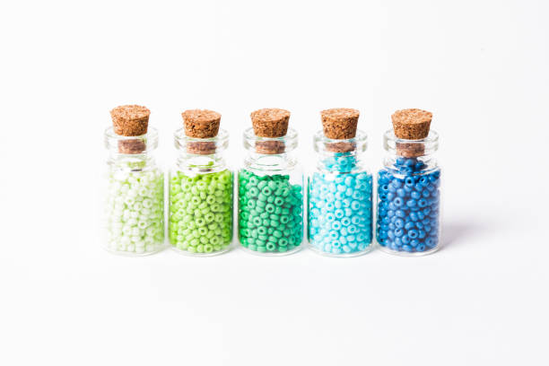 istock Colorful beads in the bottles 889032508