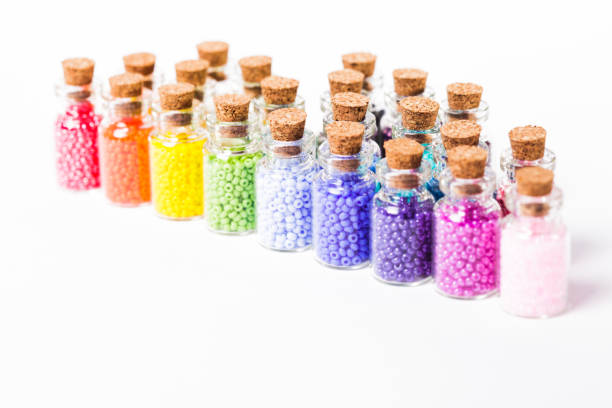 istock Colorful beads in the bottles 889032926