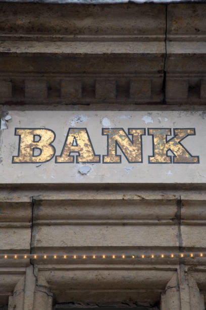 istock Bank Sign on Stone Facade 889037896
