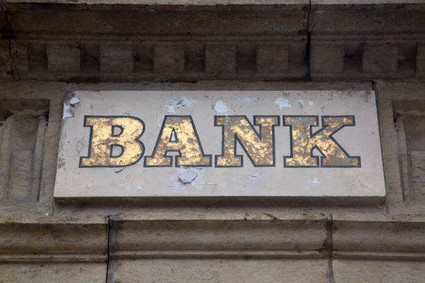 istock Bank Sign on Stone Facade 889045280
