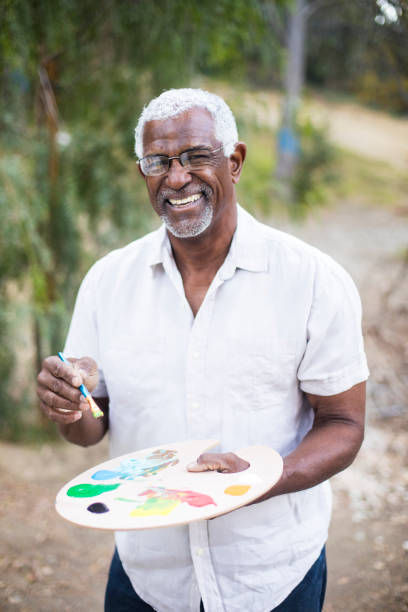 istock A retired black man painting 889045866