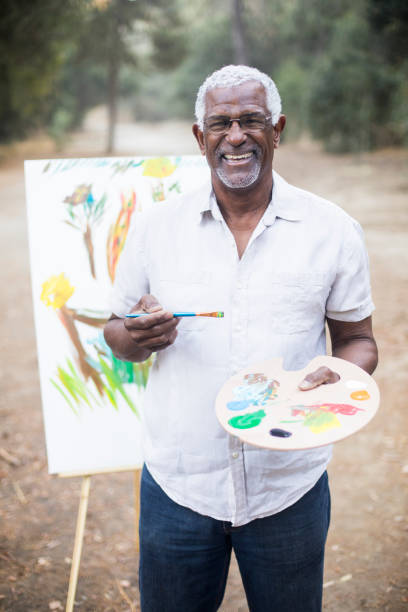 istock A retired black man painting 889045988