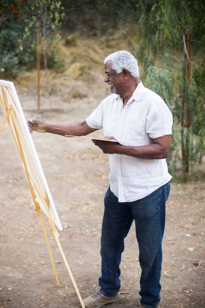 istock A retired black man painting 889046086