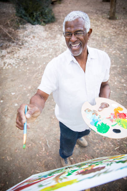 istock A retired black man painting 889046210