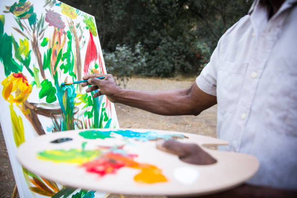 istock A retired black man painting 889046286