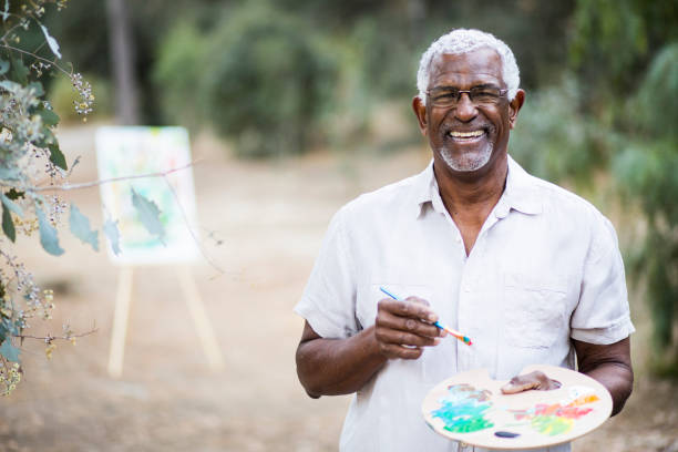 istock A retired black man painting 889046312