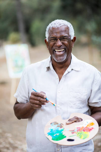 istock A retired black man painting 889046514