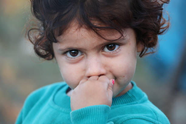 little girl in refugee camp