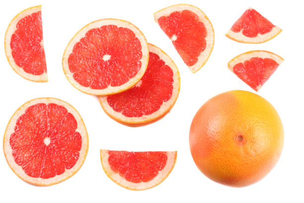 istock healthy food. sliced grapefruit isolated on white background top view 889058568