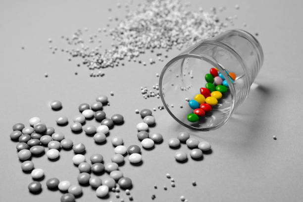 istock pile of assorted and colored candies - closeup 889059118