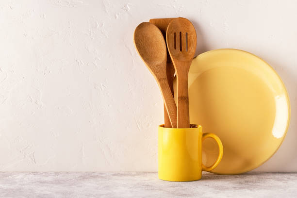 istock Crockery and cutlery on a light table. 889059528