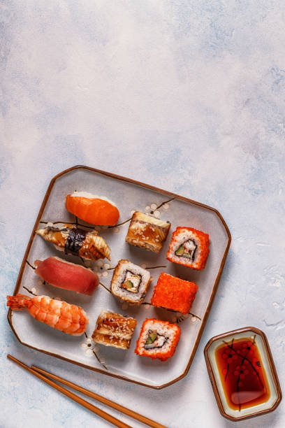 istock Sushi Set: sushi and sushi rolls on plate 889063100
