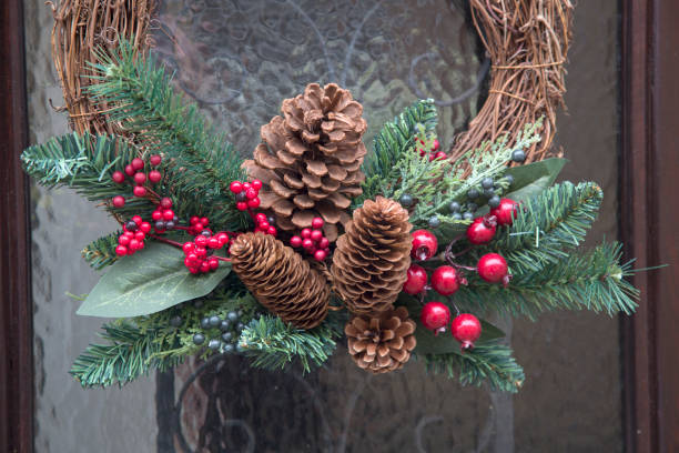 istock Christmas Wreath with Pine Cones 889063762