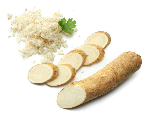 istock sliced horseradish root with parsley isolated on white background 889067938