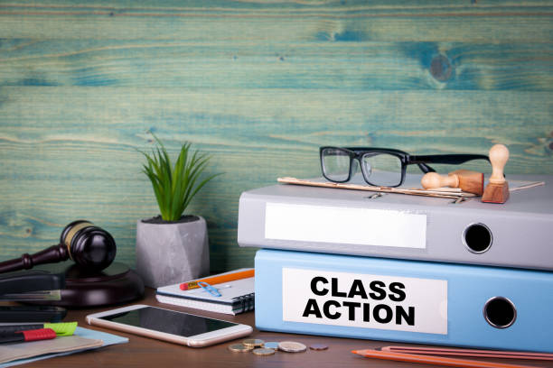 istock Class action. Binders on desk in the office. Business background 889068186