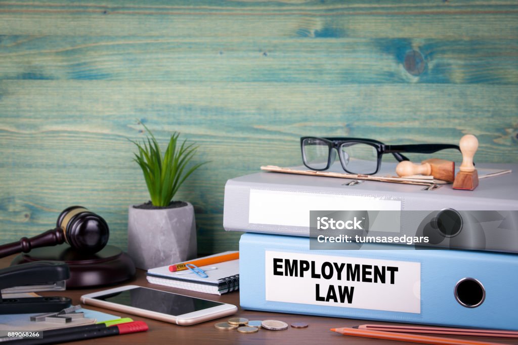 employment law concept. Binders on desk in the office. Business background Law Stock Photo