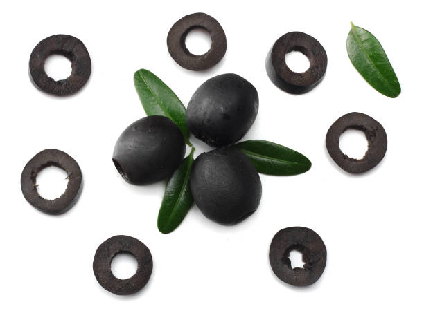 istock Marinated slices black olives isolated on white background. top view 889068298