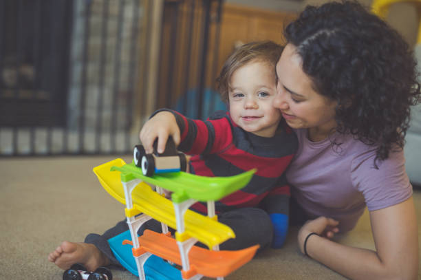 istock Mom and son play time 889077330