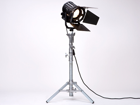 Black Studio Light used in Films or Movies on a metal stand isolated on white background