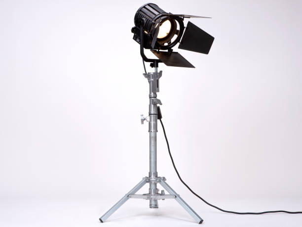 Studio Light on a metal stand. Black Studio Light used in Films or Movies on a metal stand isolated on white background film studio photos stock pictures, royalty-free photos & images