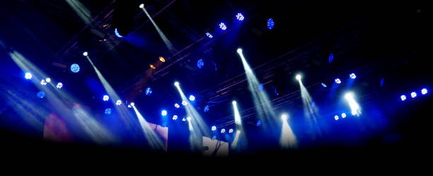 istock Dark and lighting background on concert stage. 889077840
