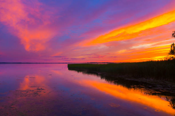 istock Beautiful colorful sunset over the lake 889077948