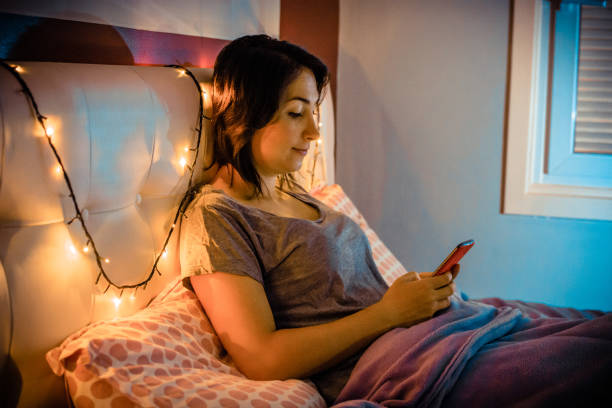 istock Young woman using a mobile phone 889086526