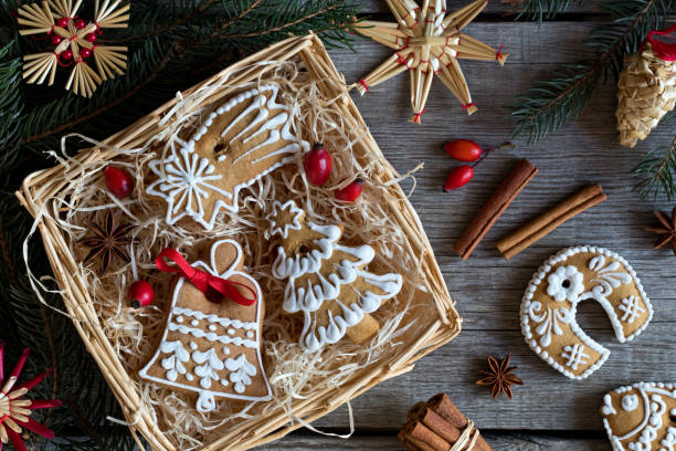 istock Decorated Christmas gingerbread cookies in a square wicker basket 889095146