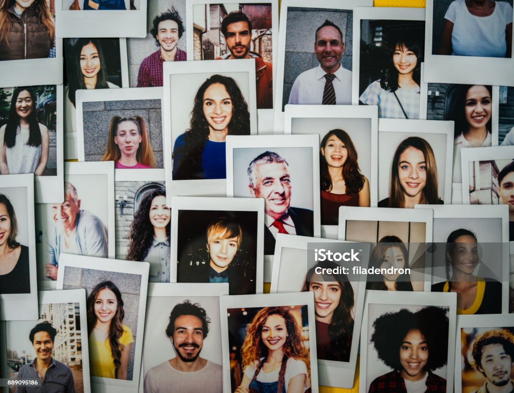 Human resources Polaroid photos of different people hanged on the wall. People Stock Photo