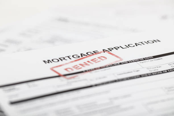 Mortgage Application A stock photo of a Mortgage application form with a red "denied" stamp denial stock pictures, royalty-free photos & images