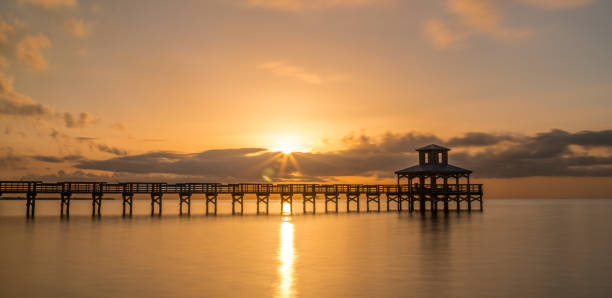 istock Sunrise over the pier 889128594