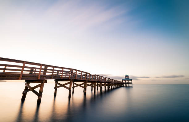 istock A pier extending out over the ocean 889128624