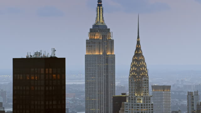 AERIAL Chrysler Building and the Empire State Building at dusk