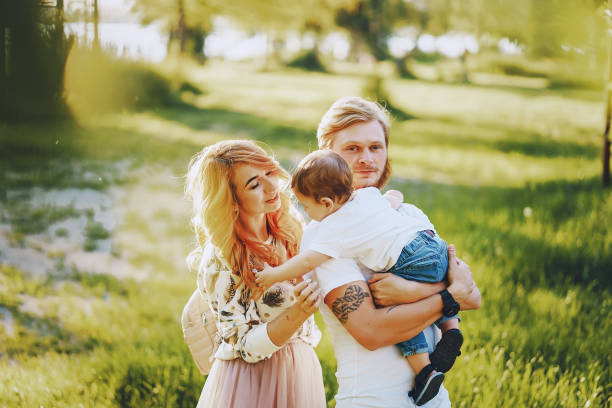istock family in a park 889133860