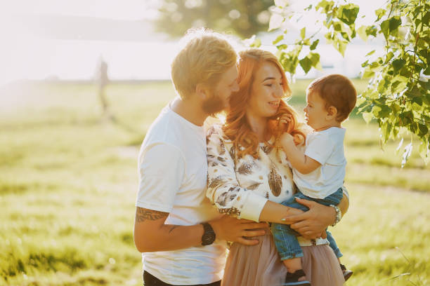 istock family in a park 889136220