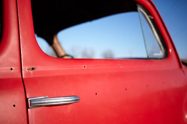 istock Side window of an old vintage red car 889137076