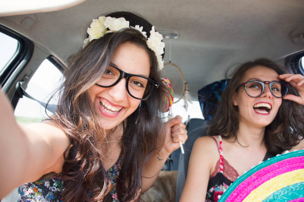 istock Women having fun in a road trip 889141690